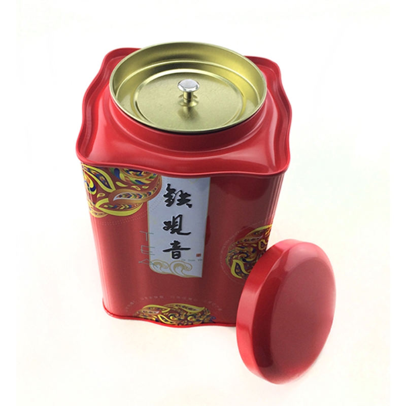 Perinteinen kiinalainen tee-tina-laatikko, jossa on kaksinkertainen kansi