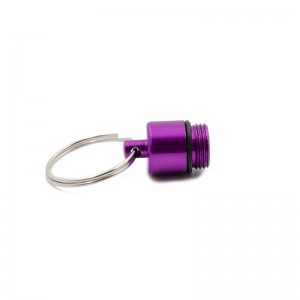 Kapselinmuotoinen yhden päivän pillerirasiakotelo alumiiniseoksesta avainnipulla