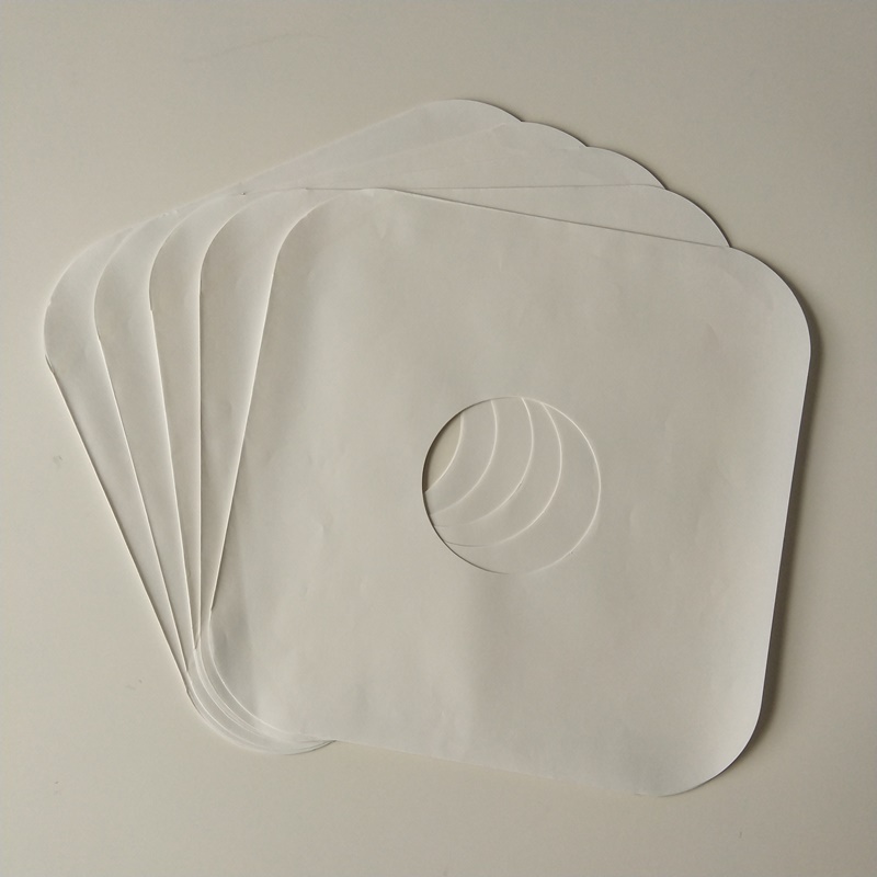 12 valkoisen kirjan LP-levy-holkki 33 kierrosta minuutissa pyöreät kulmat, joissa on reikä