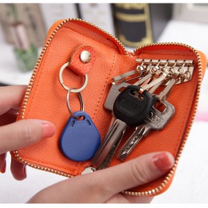 HD0827 - tukku muokattavissa olevaan auton avaimeen PU-nahkapidike, jossa 6 avainkoukkua