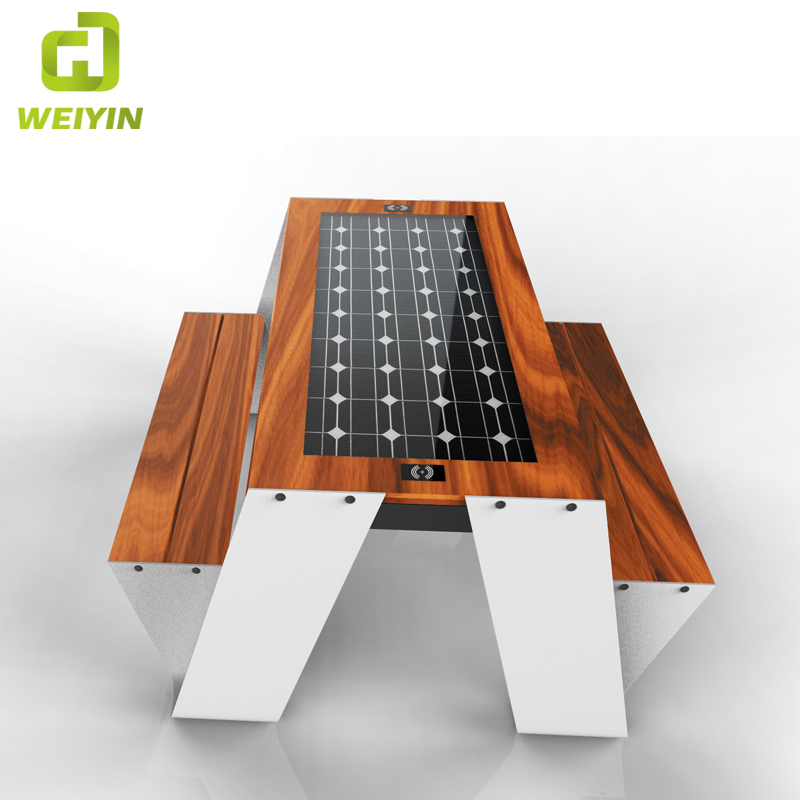 Ulkona matkapuhelimen lataaminen Smart Solar Picnic Steel -pöytäpenkkitoimittaja