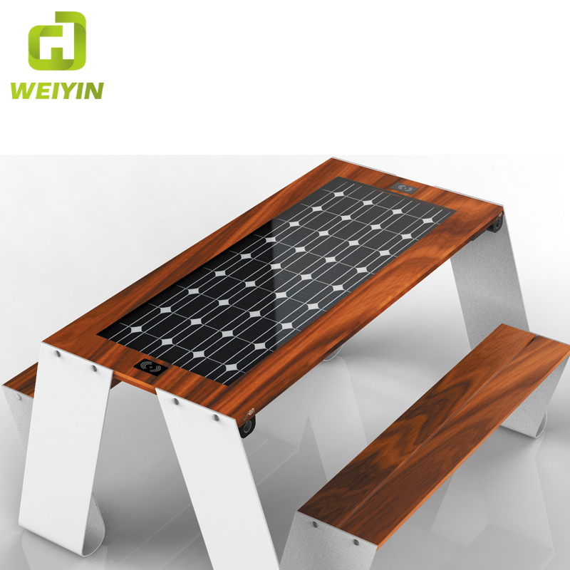 Ulkona matkapuhelimen lataaminen Smart Solar Picnic Steel -pöytäpenkkitoimittaja