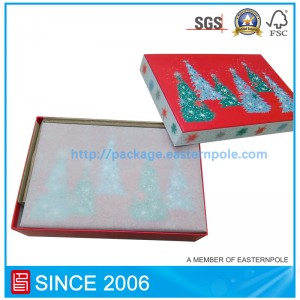 Joulu asettaa lahjapakkauksia