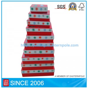 Joulu asettaa lahjapakkauksia