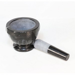 Musta marmorilaasti ja survin