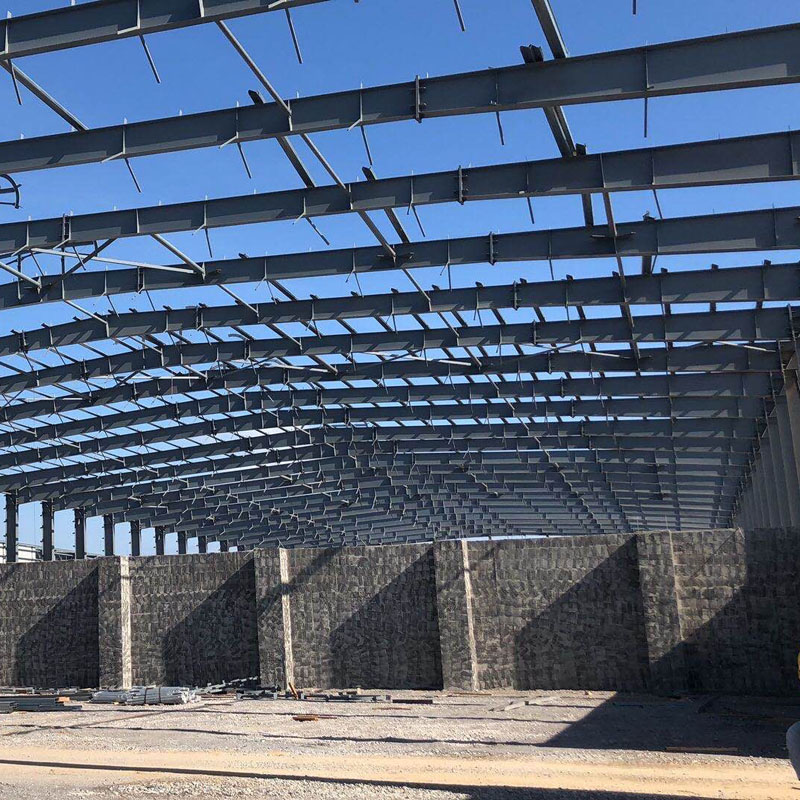 Tukkumyynnin räätälöity teollisen teräsrakenteen sarjan rakennustyöpajavarasto