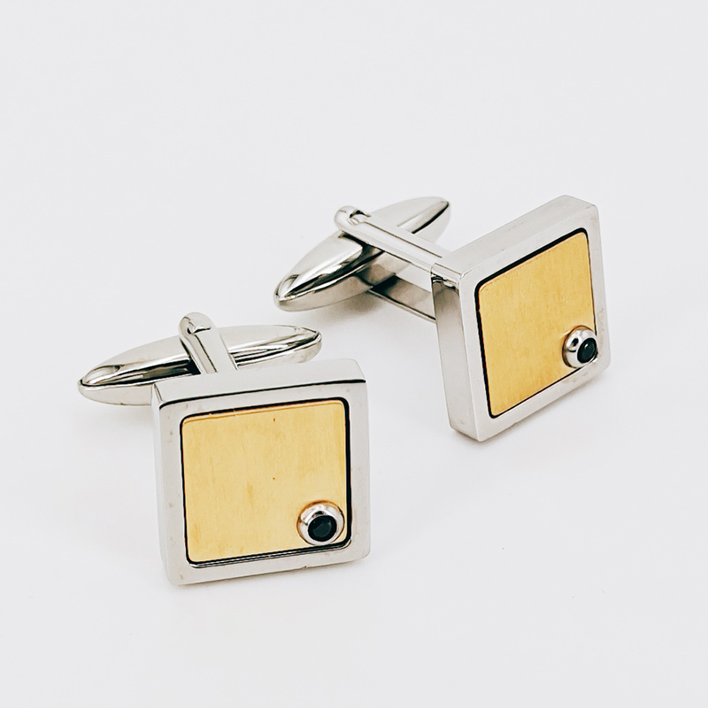 Miesten kaksisävyiset kullatut ruostumattomasta teräksestä valmistetut kalvosinnapit musta CZ-kivi