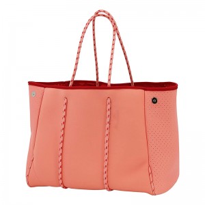 Mittatilaustyönä valmistettu vedenpitävä rei\'itettyneopreeni-rantakassineopreenipussilla