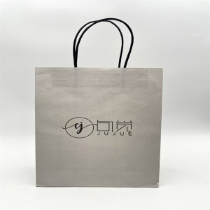 Harmaa lahjapussi, lahjapakkauspussi, trendi on yksinkertainen