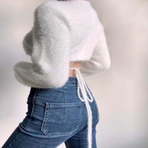 Seksikäs syvä V-kaula-aukkoinen vyötärö lyhytneulottuneuletakki