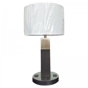 Kaksi ääntä musta ja harjattunikkelipöytäpöytävalaisin, jossa on/off -keinukytkin ja kaksi kätevää pistorasiaa huoneessa