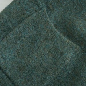 Hienoneuletakinnaisen muotipusero