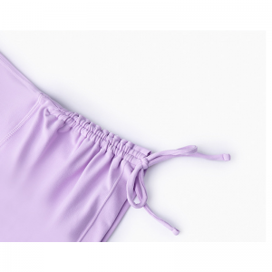 Piirrä rypistyen yksiosainen joogahousut