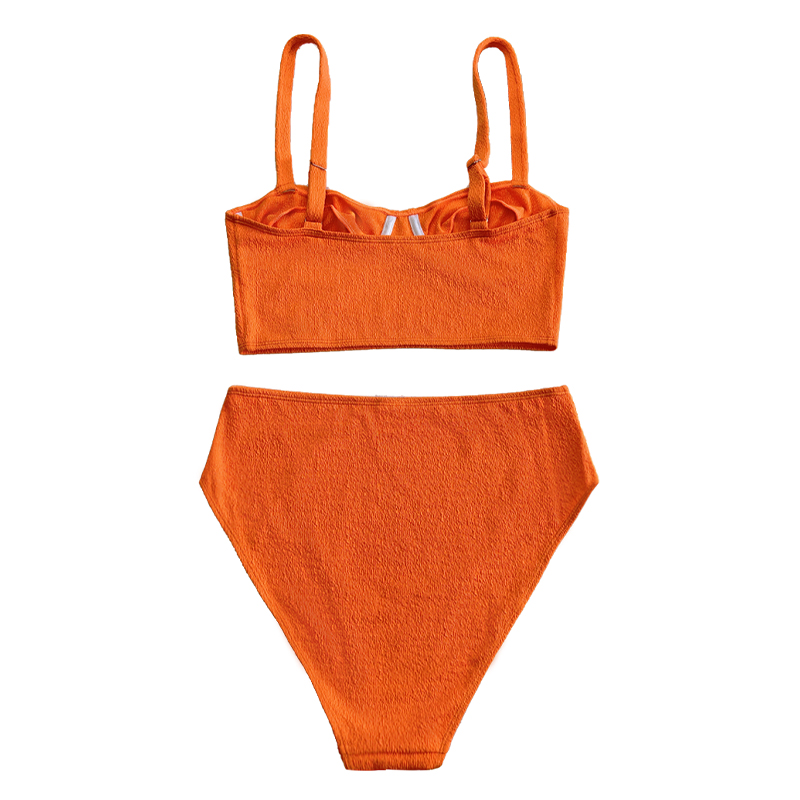 Oranssi rypistynyt kangas leveä helma rintakuva Linko uimapuku